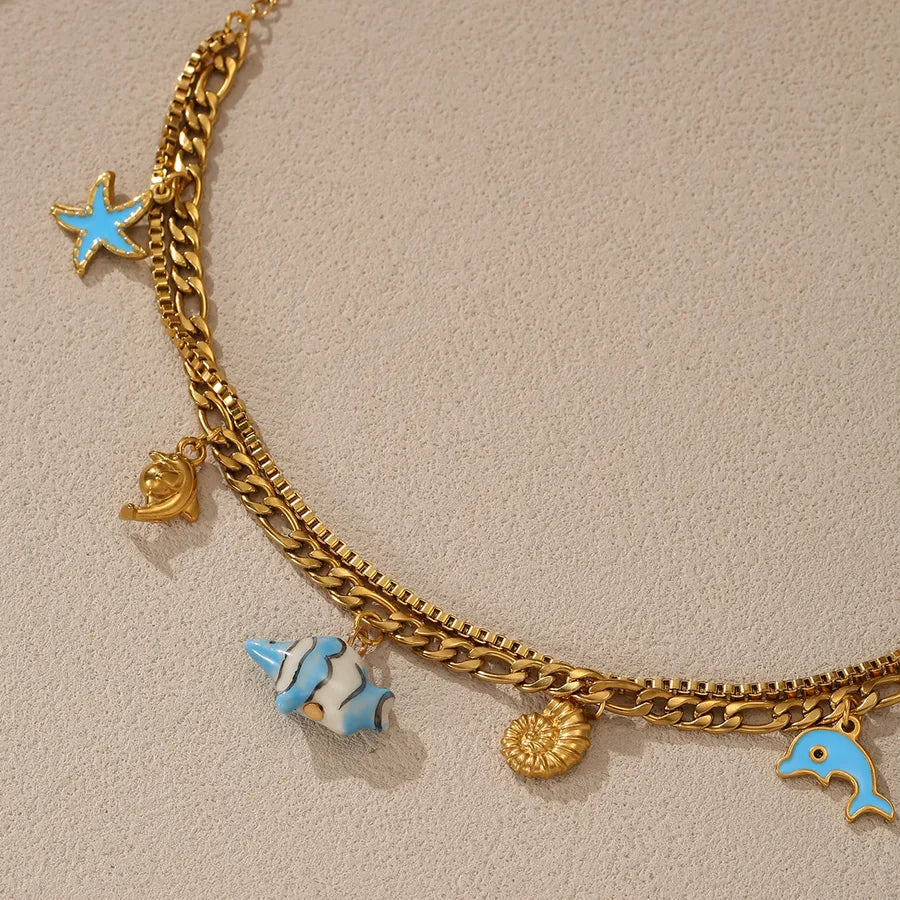 18K Gold Dolphin & Fish Charm Bracelet