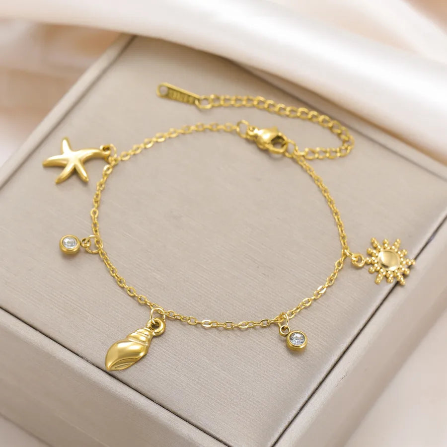 Ocean Starfish Charm Bracelet – Gold & Zircon