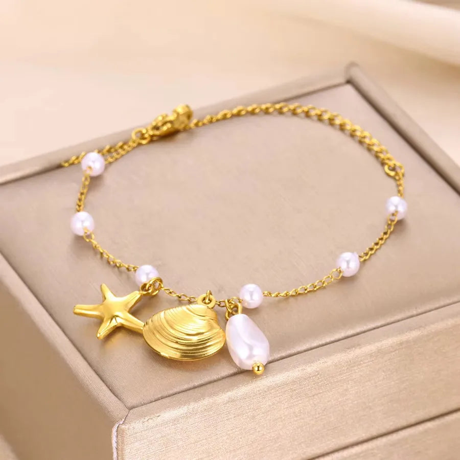 Gold Ocean Anklet with Dolphin & Starfish Charms