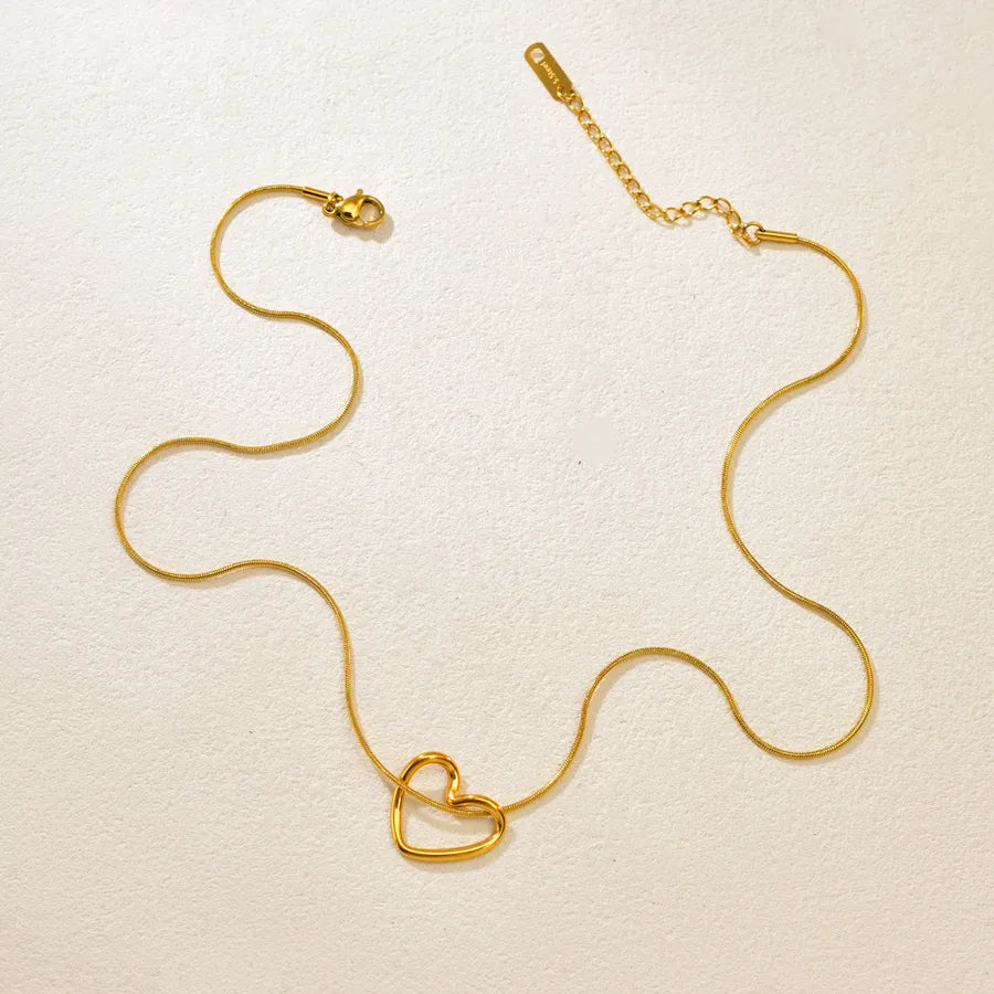 Gold Twisted Heart Pendant Necklace