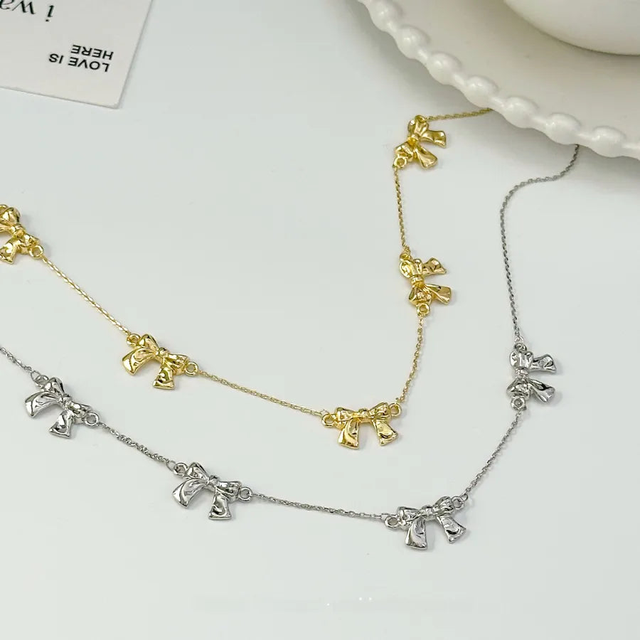 Gold Plated Butterfly Knot Pendant Necklace