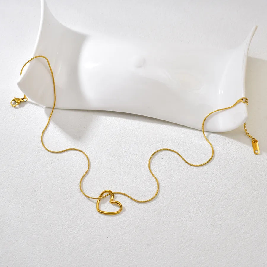 Gold Twisted Heart Pendant Necklace