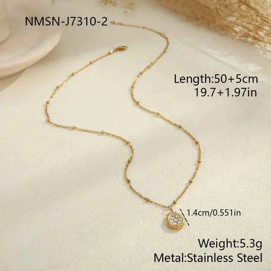 Gold Star & Moon Pendant Necklace