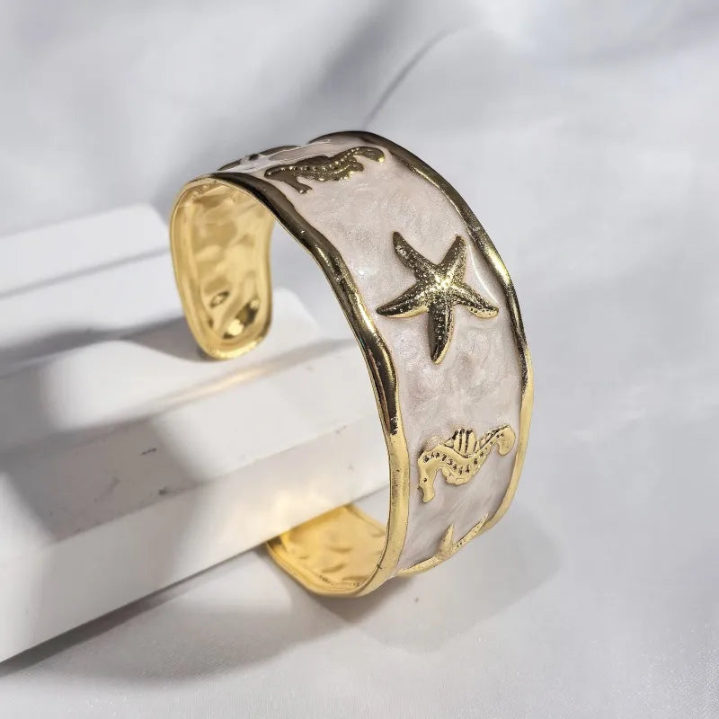 Gold Starfish & Seahorse Stainless Steel Bangle