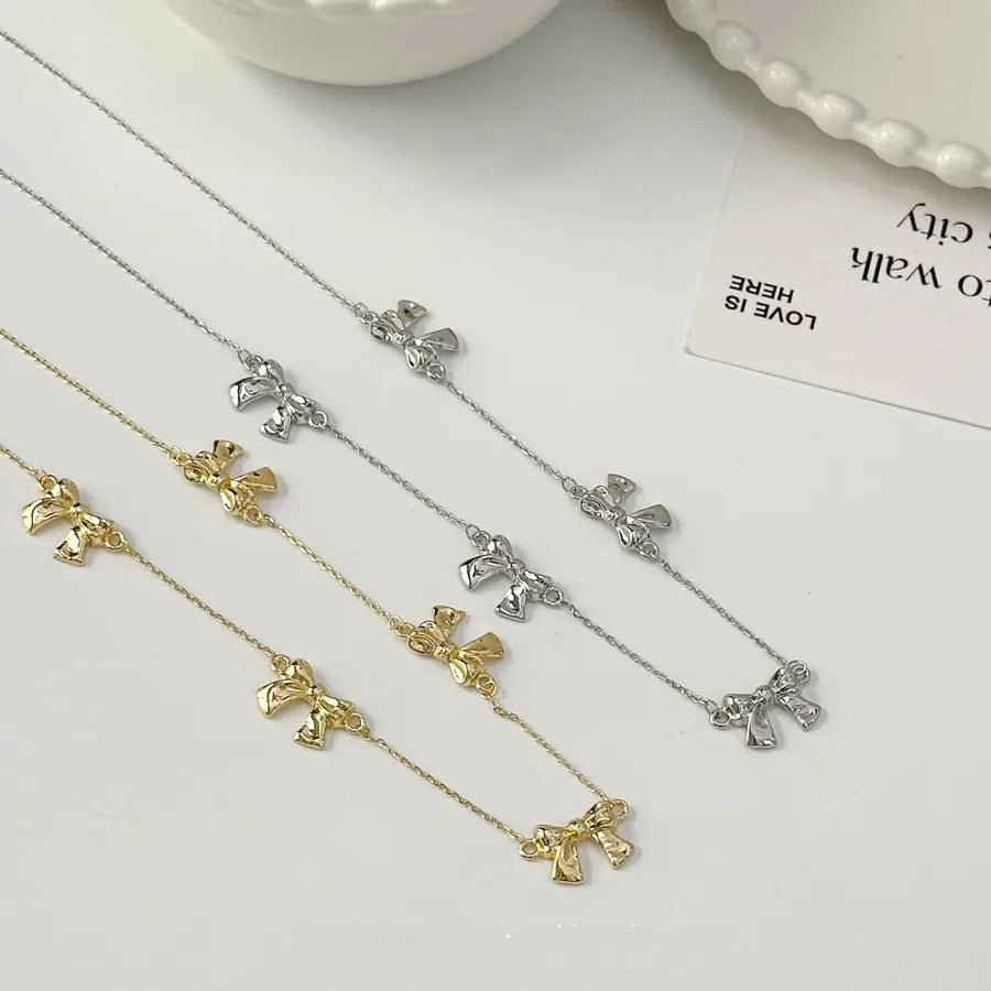 Gold Plated Butterfly Knot Pendant Necklace