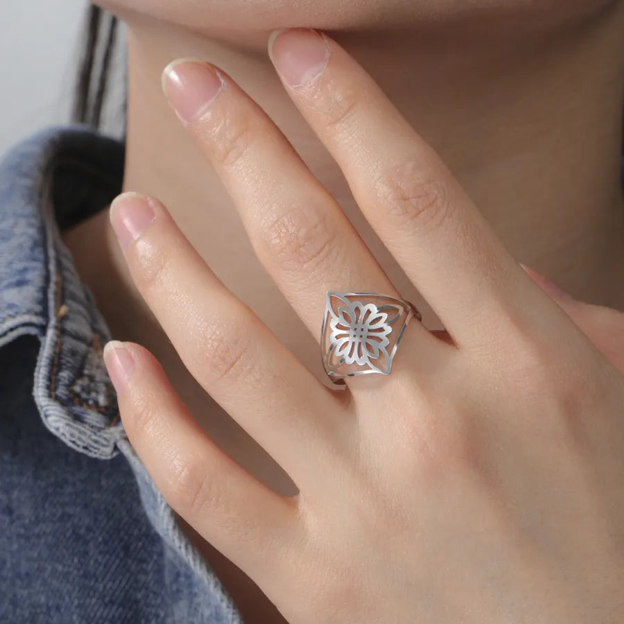 Hollow Flower Witch Knot Ring – Gold Stainless Steel