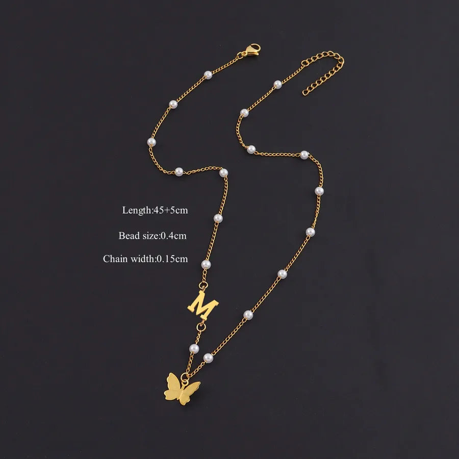 Gold Butterfly Letter Pendant Necklace Gold m