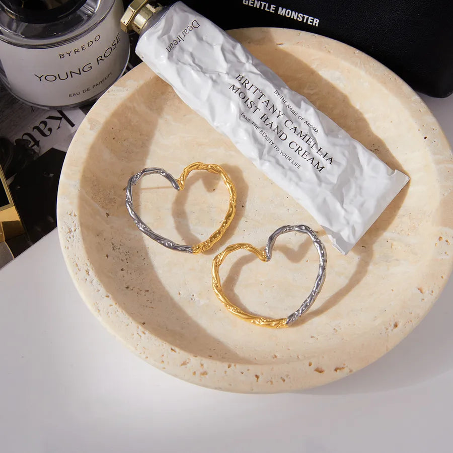 Gold & Silver Twisted Heart Earrings