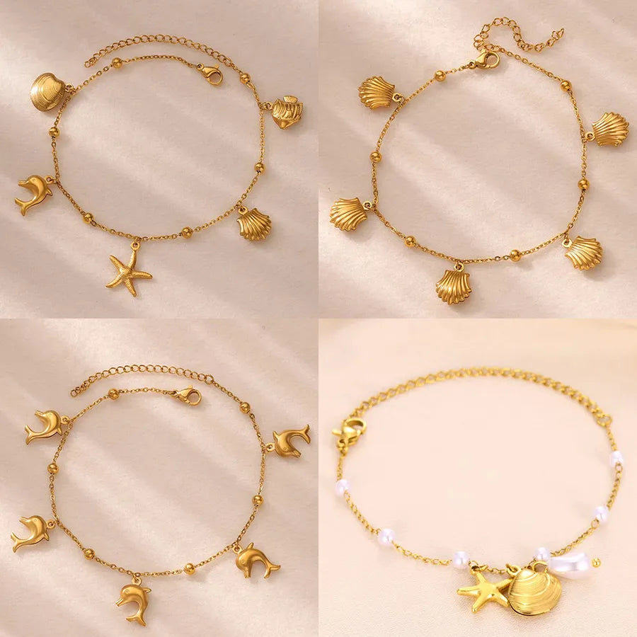 Gold Ocean Anklet with Dolphin & Starfish Charms