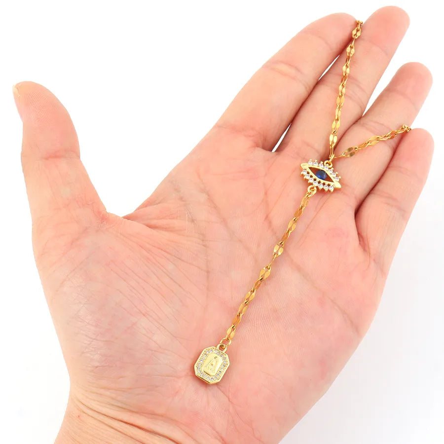 Gold Eye Pendant Necklace with Zircon Accents