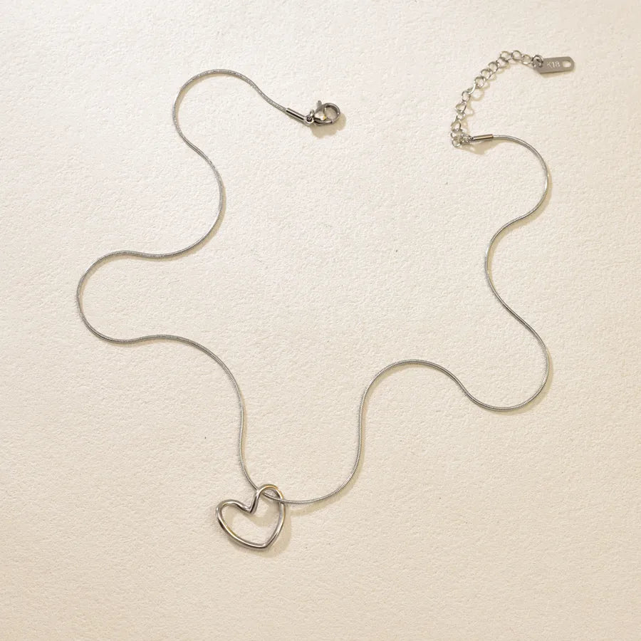 Gold Twisted Heart Pendant Necklace