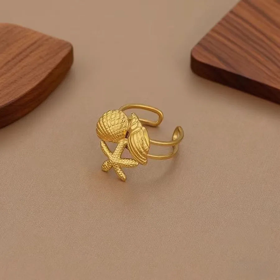 Hollow Seahorse Ring in Stainless Steel Z0197-Starfish Shell Conch Ring - Gold