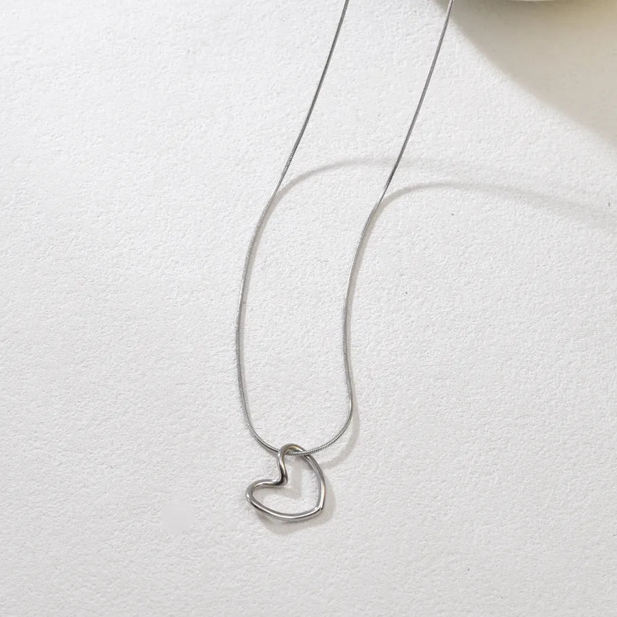 Gold Twisted Heart Pendant Necklace