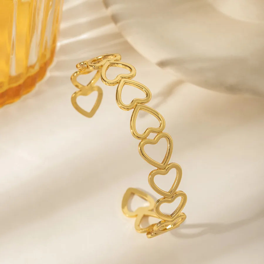 18K Gold Plated Stainless Steel Open Bangle Stainless Steel Electroplated 18k Real Gold Heart Interwoven Hollow Open Bracelet Style 3