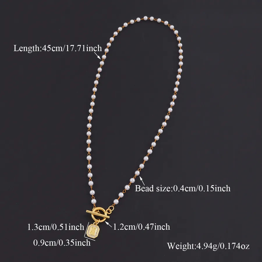 Elegant Pearl Initial Pendant Necklace