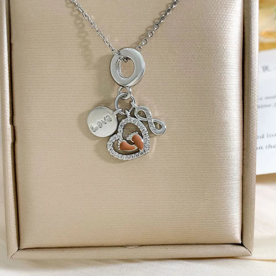 Global Travel Pendant Necklace for Women XL1863 Heart Foot Necklace Silver