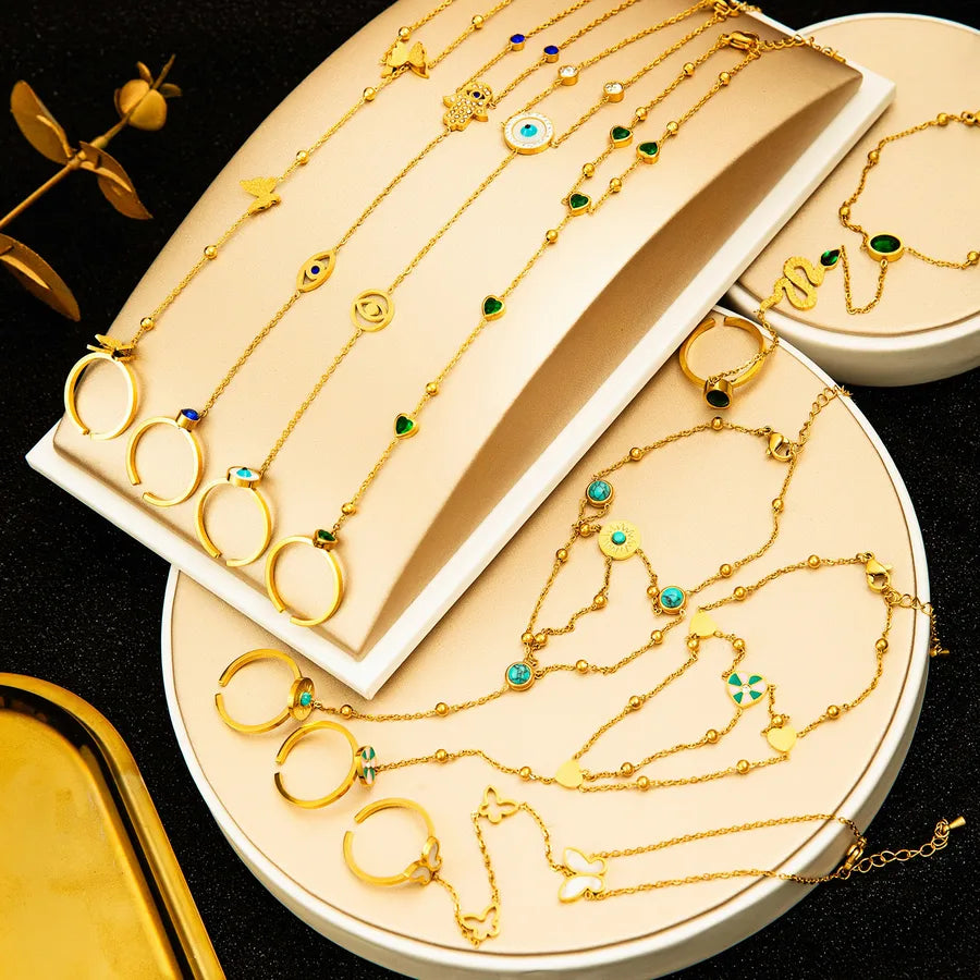 Gold Plated Heart & Butterfly Finger Bracelet