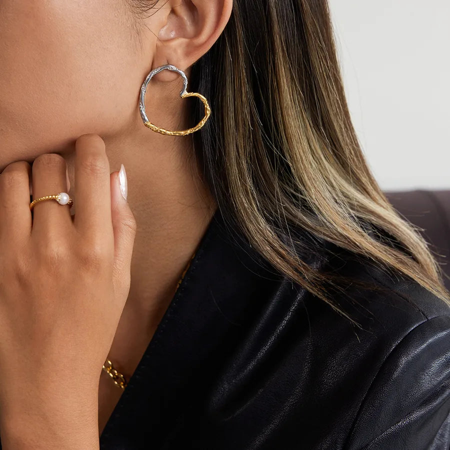 Gold & Silver Twisted Heart Earrings