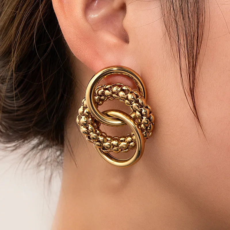 Retro Titanium Steel Hollow Earrings