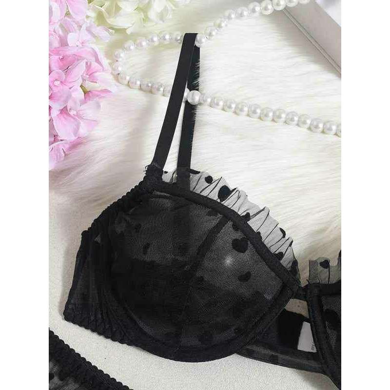 Smiling Maria sheer lace lingerie set featuring a delicate black bra with frill details and polka dots
