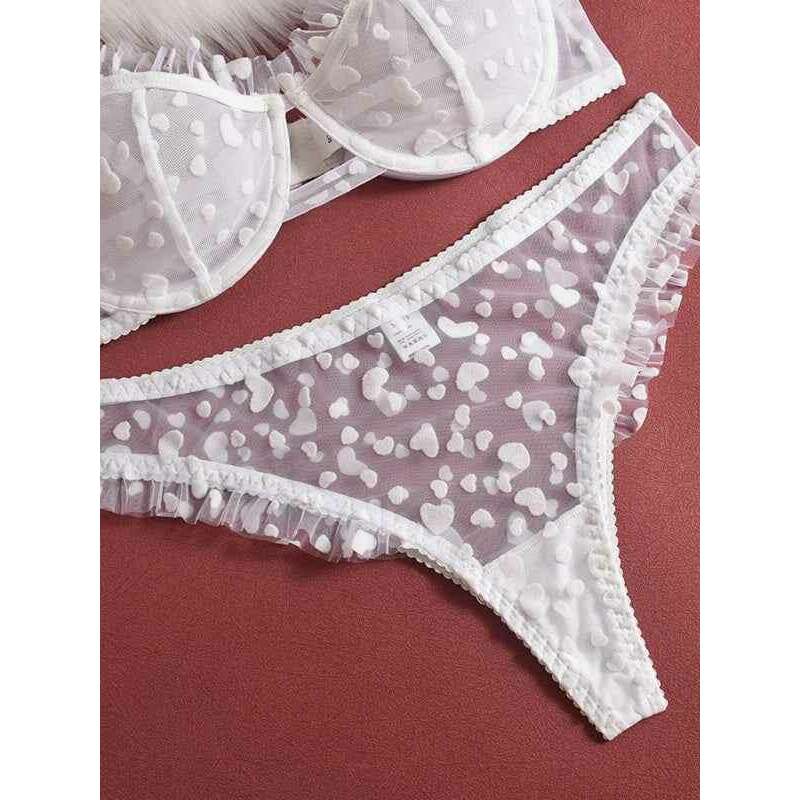 Smiling Maria sheer lace lingerie set featuring a heart-patterned bra and matching thong in white