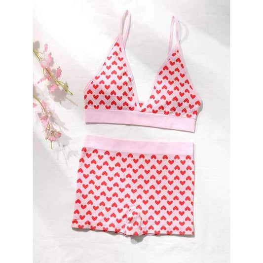 Smiling Maria Valentine's lingerie set for women featuring a heart print bralette and matching shorts